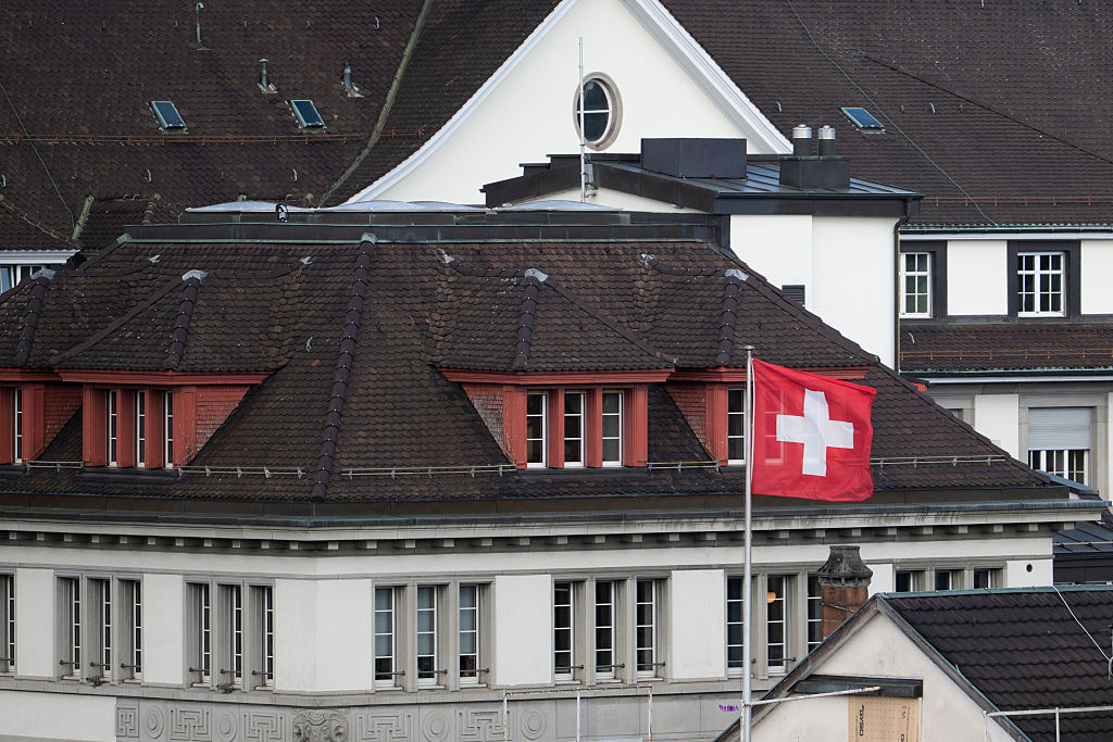 Swiss voters reject climate tax for super-rich and compulsory civic duty