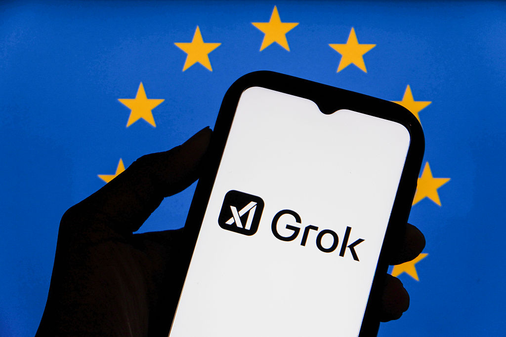 In this photo illustration, the Grok logo, a generative