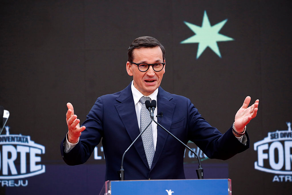 Former Polish PM leads party split in challenge to PiS leader
